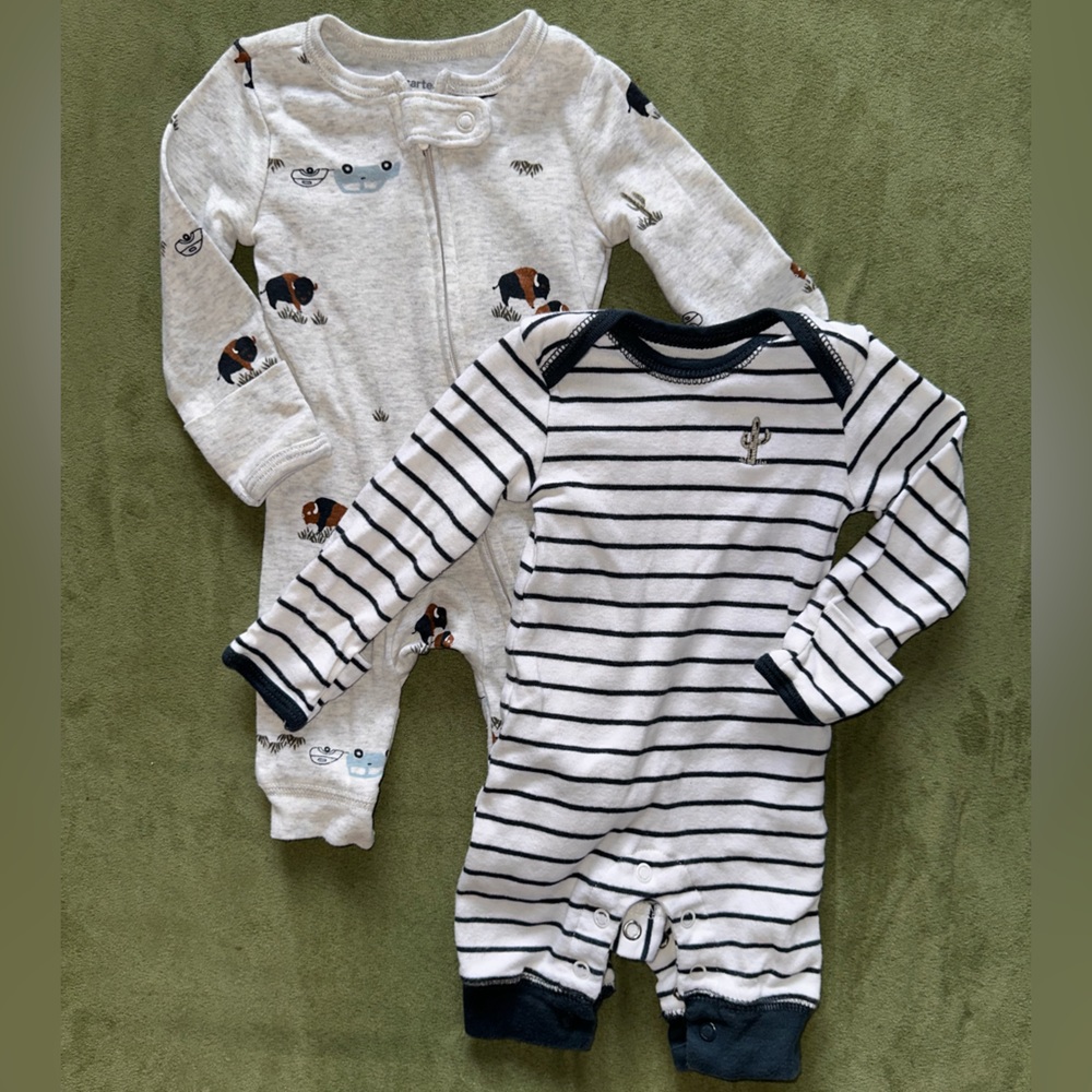 Carters one piece outfits. Never worn. In great condition.